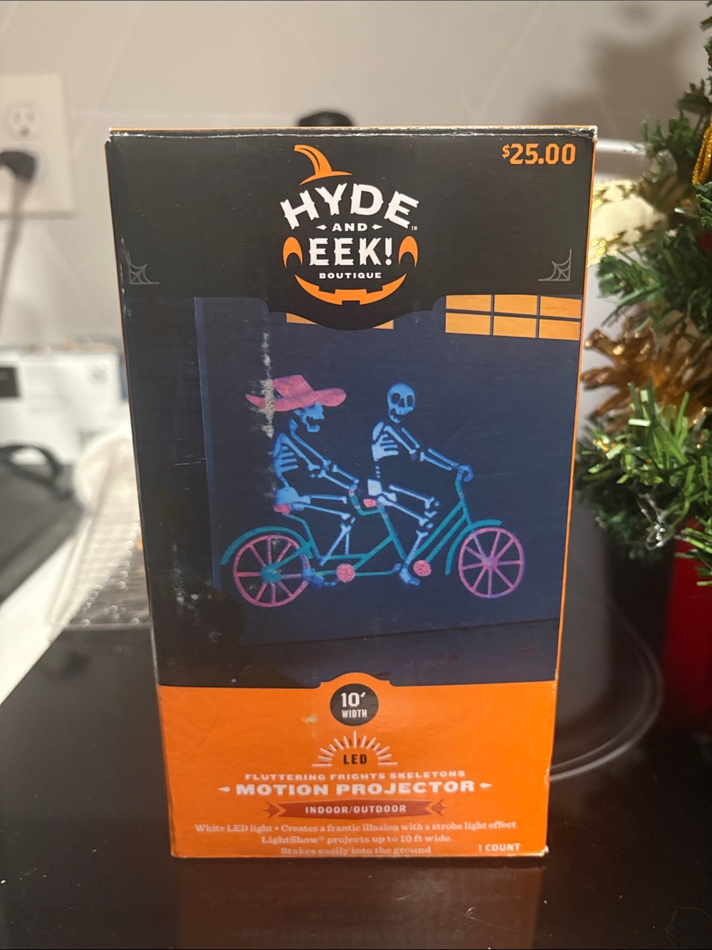 Hyde and eek! LED Motion Projector -  Skeletons on a bike